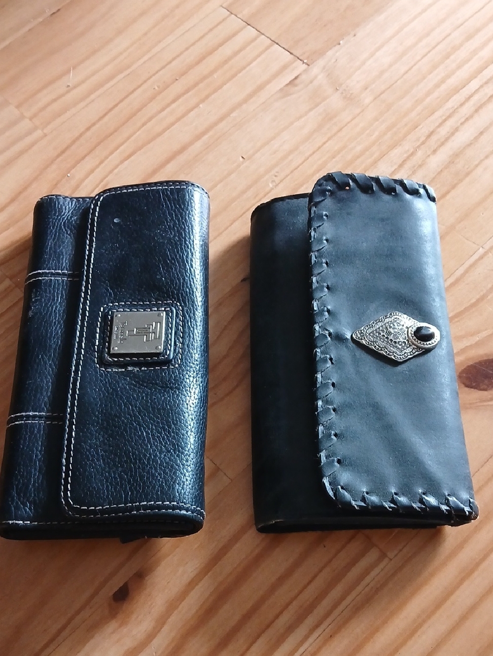 Tignanello Black Leather Wallet with Silver Logo Plaque and Contrast Stitching